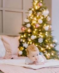 Obraz na płótnie Canvas kid background Christmas tree garlands shiny glitter