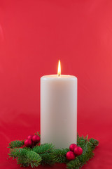 Holiday arrangement with greenery