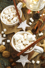 Fototapeta na wymiar Hot chocolates with marshmallows and Christmas cookies