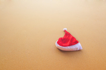 Christmas Santa hat on the beach. are texture Nature background creative tropical layout made at phuket Thailand