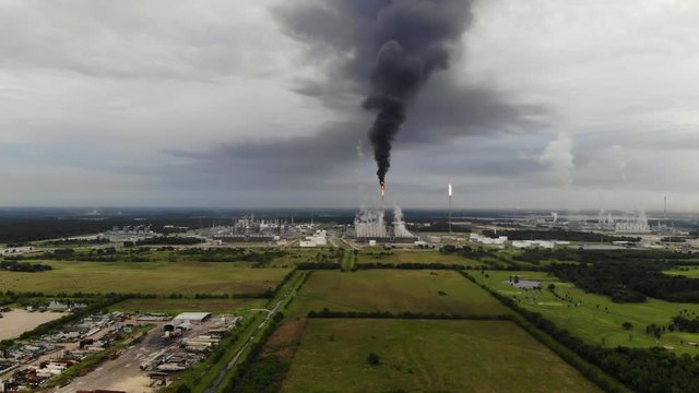 Chemical Plant Conducting Controlled Flaring to Burn Off Excess Materials in Channelview near Houston, Texas Filmed by Drone