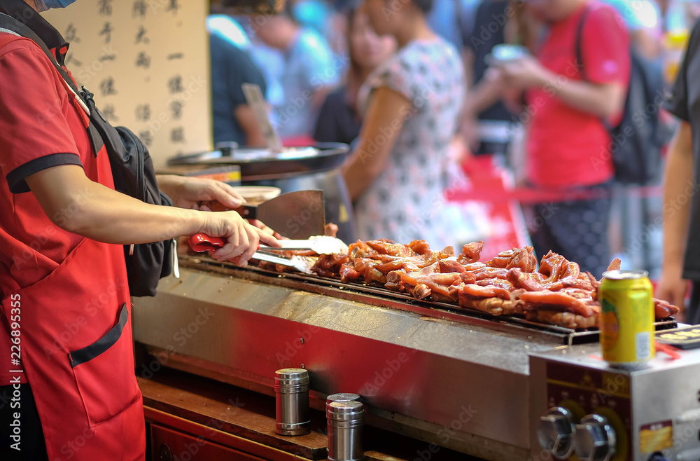 Wall mural Pork barbecue grill, It's famous for tourist . Many tourist would like ti taste it.