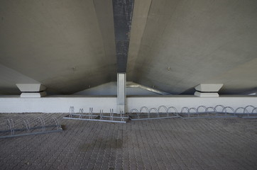 under a white bridge