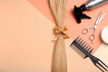 Flat lay composition with hair salon tools and space for text on color background