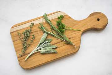Fresh Herbs on a Cutting Board