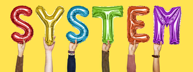 Colorful alphabet helium balloons forming the text system