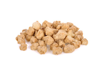 pile of textured soy protein on white background