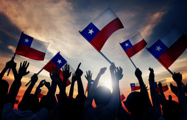 Silhouettes of People Holding Flag of Chile