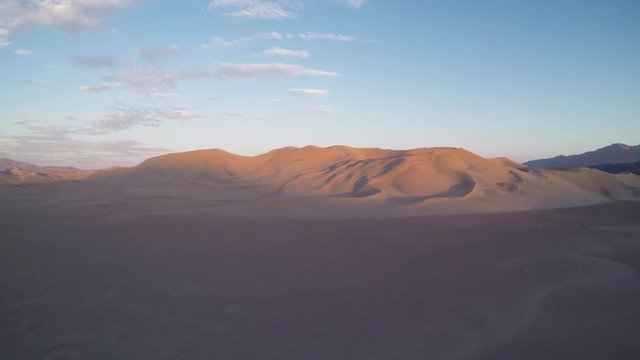 Sunset over dunes in Mojave Desert, aerial