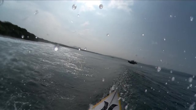 POV, surfer wipes out on ocean wave