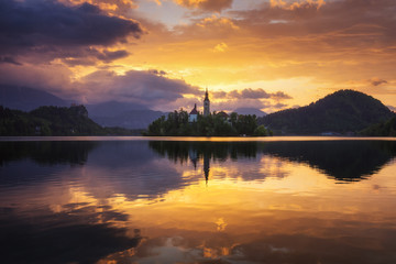 Lake Bled Slovenia. Beautiful mountain Bled lake with small Pilgrimage Church. Most famous Slovenian lake and island Bled with Pilgrimage Church of the Assumption of Maria. Bled, Slovenia.