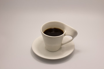 Hot coffee americano in a cup at white background