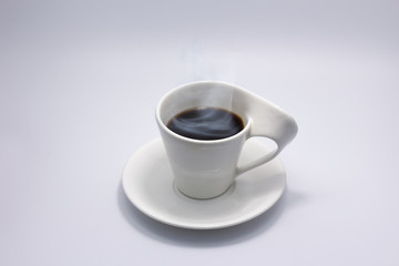 Hot coffee americano in a cup at white background