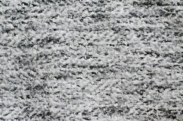 The photo of black and white color sofa cover taking as background.