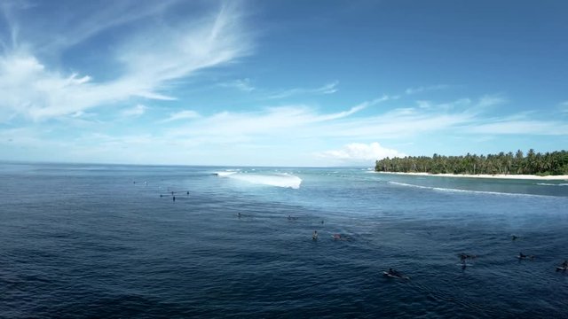 Surfers off Mentawai Island coast, aerial