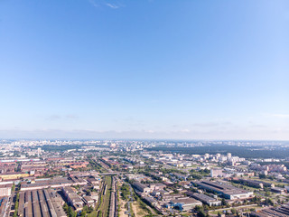 Fototapeta na wymiar aerial panoramic view of city industrial area with multiple buildings