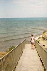 young woman on pier
