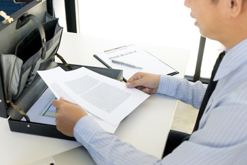 Young Business man insurance agent show document contract