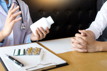 doctor explaining patient symptoms or asking a question