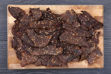 dried beef slices in spices with sesame seeds