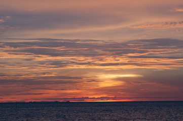 Fototapeta premium Beautiful red sunset over the ocean