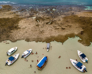 Aerial view of boats in Moreré Reefs, Moreré Beach, during low tide, natural pools, Boipeba Island