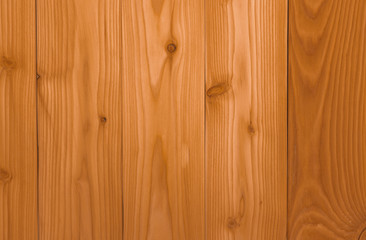 Closeup yellow wood texture background. Wood texture with unique pattern.Empty brown wooden wall. Wooden board. Orange wood timber. Surface of wood with art pattern. Brown background for product.