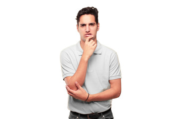 Young handsome tanned man with a goofy, dumb, silly look, feeling shocked and confused at a recent...