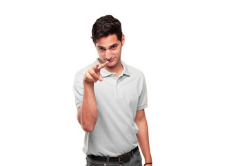 Young handsome tanned man looking, observing, keeping an eye on an object in front, or watching out...