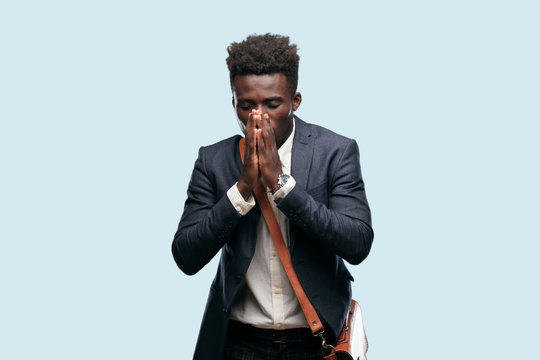 young black businessman Coughing, suffering a winter illness such as a cold or the flu, feeling unwell and feverish.