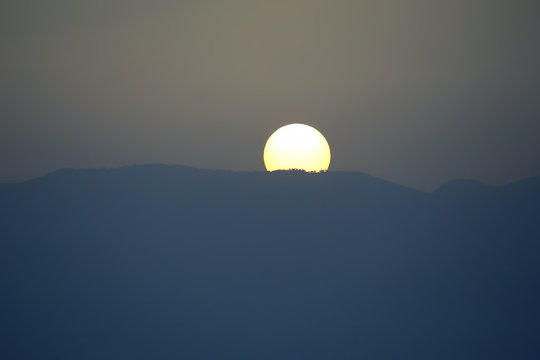 Fototapeta sunrise on top of a mountain