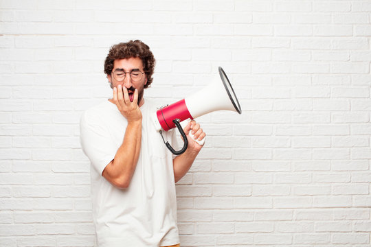 young dumb man Coughing, suffering a winter illness such as a cold or the flu, feeling unwell and feverish.