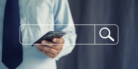 Businessman using Searching Browsing Internet internet of things (IoT)