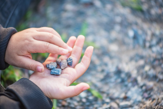 Close view of little girl hands while playing
