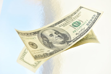 Hundred dollar banknote on white background. Money and banking.