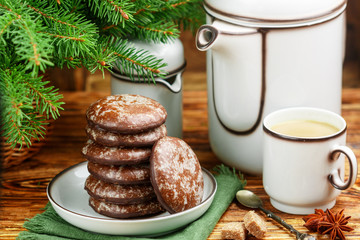 Delicious gingerbread cookies with icing sugar and chocolate for Christmas. New year. Dessert for gourmets
