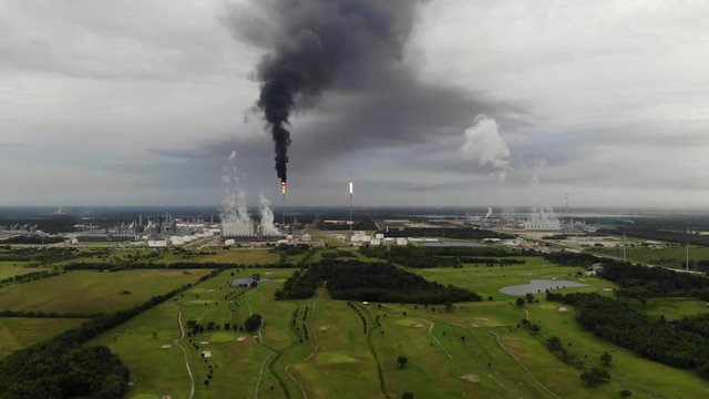 Chemical Plant Conducting Controlled Flaring to Burn Off Excess Materials in Channelview near Houston, Texas Filmed by Drone