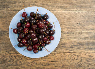 Fresh Berries on Rustic Wooden Background for Design Montage or Layout