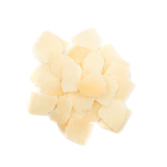 Pile of parmesan cheese flakes and crumbs isolated