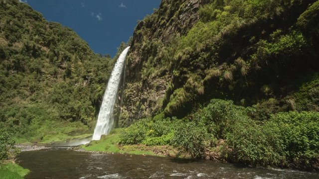 Condor Machay Waterfall in a lush cloudforest valley, the Rio Pita Valley,  near Cotopaxi Volcano, Ecuador. Time-lapse.