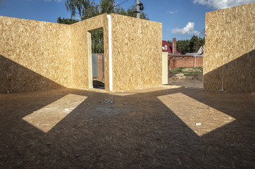 Construction of a wooden house of SIP panels.