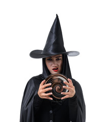 Portrait of woman in black Scary witch halloween costume standing with hat isolated on white background