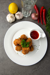 deep fried meatballs on table