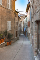 Fototapeta na wymiar Houses in a Street of Urbino