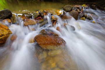 Continuous water flowing in the river of Ulu Bendul, Malaysia