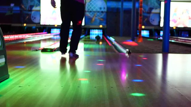 Bowling night out with neon lights and bowling shoes.