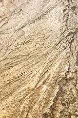 Natural brown rock texture eroded by the water