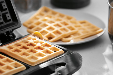 Cooking of Belgian waffles