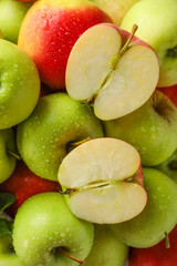 Cut and whole ripe apples