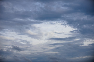 Fototapeta premium Rain clouds forming with blue sky background